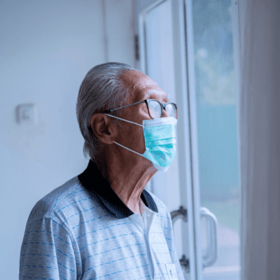 Elderly man wearing mask